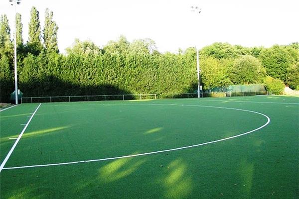 Renovatie kunstgras hockeyveld - Sportinfrabouw NV